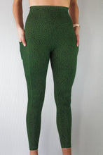 Load image into Gallery viewer, Front of green dapple leggings by Mama Life London