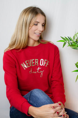 Cherry red Never Off Duty sweatshirt with leopard print slogan