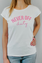 Load image into Gallery viewer, Never Off Duty pink slogan and white t-shirt untucked